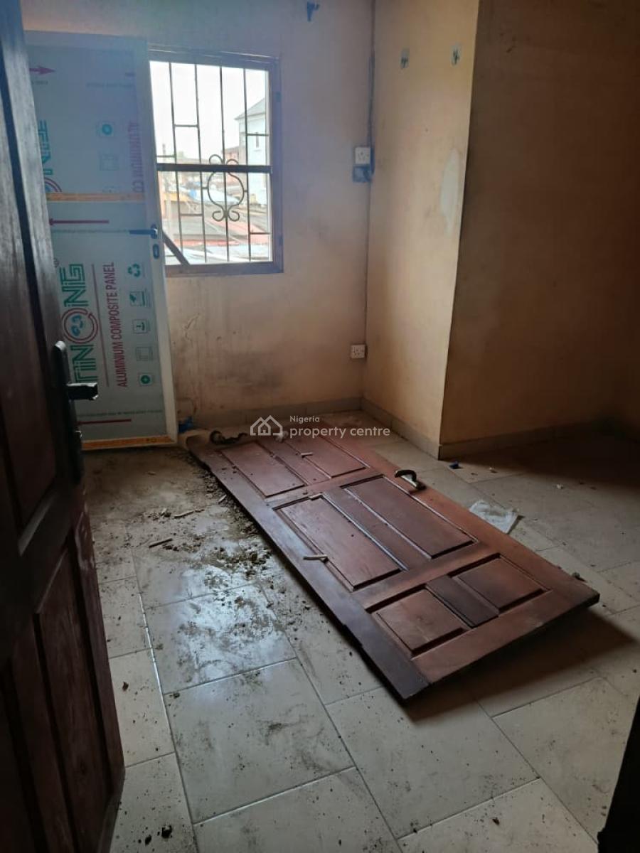 Renovated Two-bedroom Apartment on First Floor with Balcony, Off Arowojobe Road, Oshodi, Lagos, Flat / Apartment for Rent