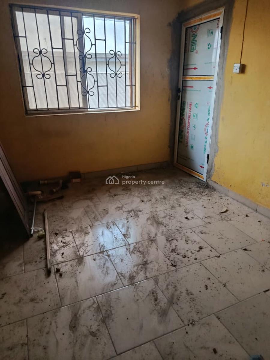 Renovated Two-bedroom Apartment on First Floor with Balcony, Off Arowojobe Road, Oshodi, Lagos, Flat / Apartment for Rent