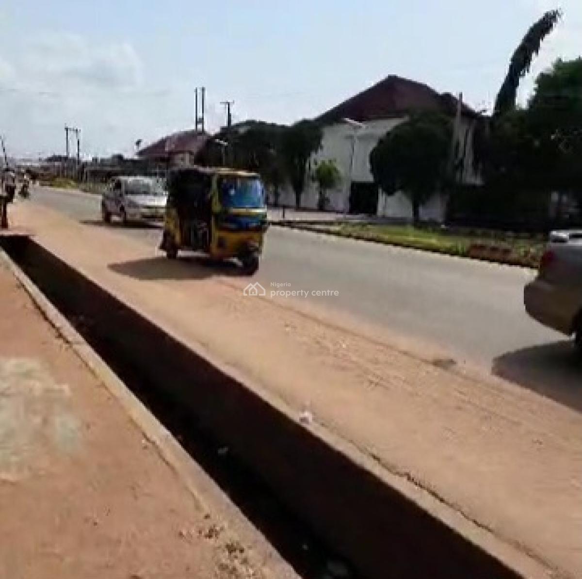 200ft By 220ft Commercial Land Fenced Round, Along Ebo Irhirhi Road Near Market Square, Airport Road Gra, Benin, Oredo, Edo, Land for Sale