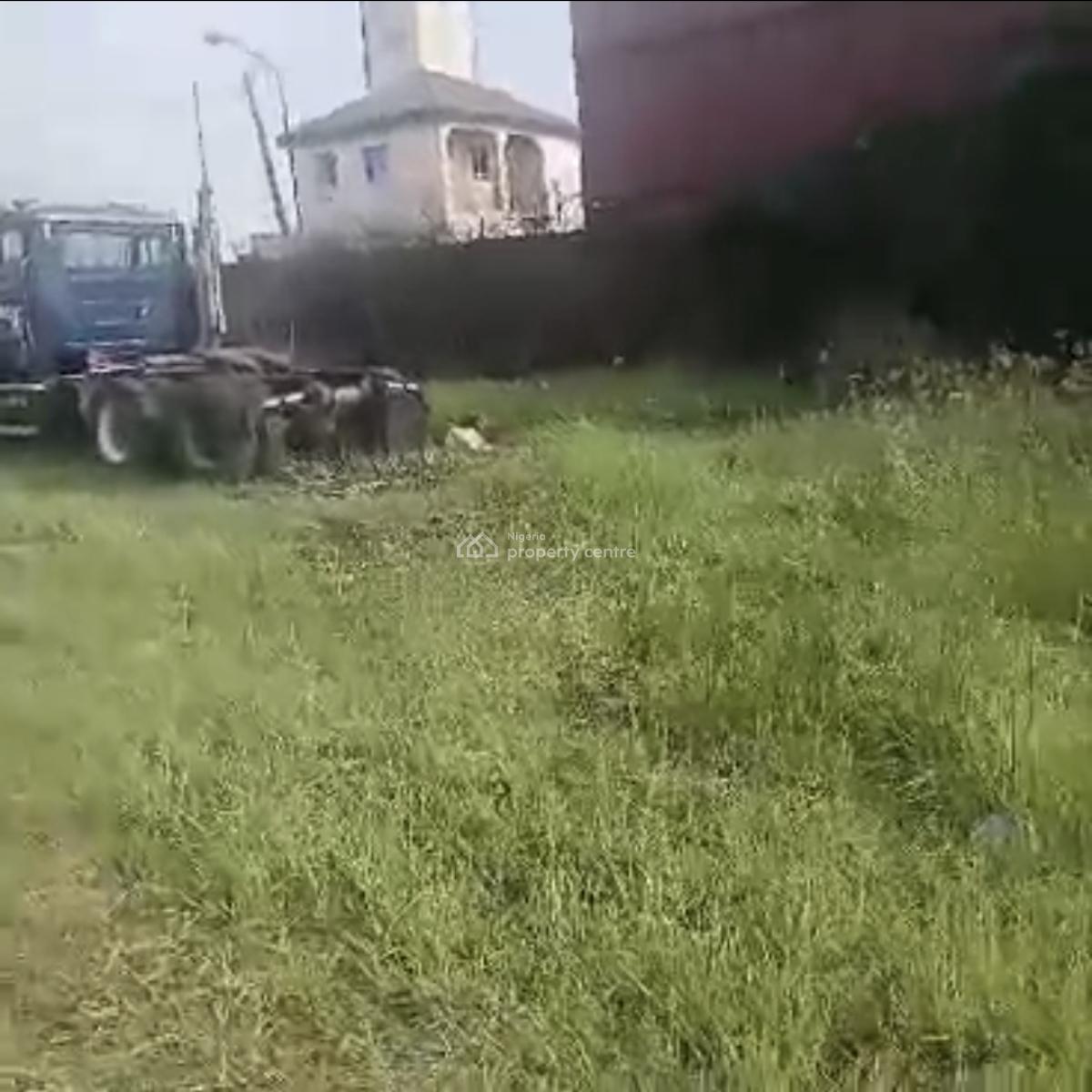 4300sqm Land with Structure  Good for:- Factory, Trailer/truck Park,, Directly Along Oshodi/ Apapa Express Way., Oshodi, Lagos, Commercial Land for Sale