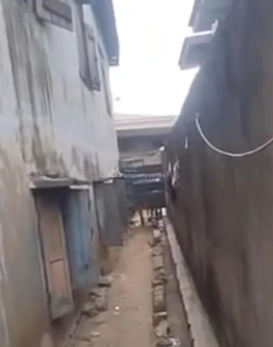 Demolishable Building on a Half Plot of Land Measuring 350sqm in a Sec, Oluwakemi Street, Onipanu, Shomolu, Lagos, Land for Sale