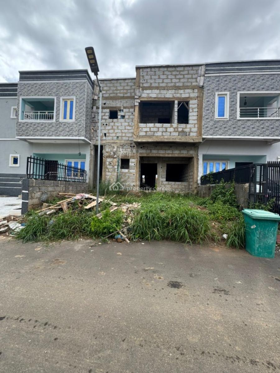 4bedroom Terrace Duplex Carcass at   Location: Palmheight Estate Phase, Lugbe, Lugbe District, Abuja, Terraced Duplex for Sale