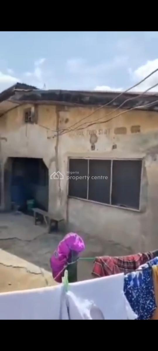 a Bungalow on a Very Strategic Position   Location: Off O, Surulere, Lagos, Block of Flats for Sale