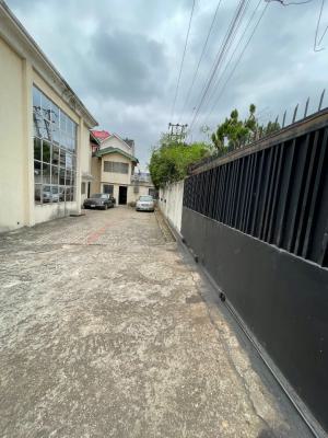 Solidly Built 15 Bedroom Structure Plus Another 8 Room Building on 1200SQM