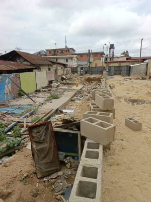 an Half Plot of Land Is Up, Oguntolu Street Off Shipeolu Street, Shomolu, Lagos, Mixed-use Land for Sale