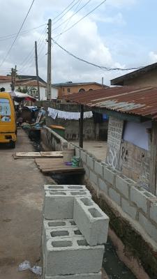 More Than Half Plot of Land with Demolishable Building on a Tarred Roa, Orimolade Street, Off College Road, Ogba, Ikeja, Lagos, Block of Flats for Sale