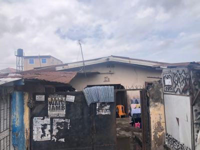 Demolishable Property 14 Rooms on Full Plot of Land Fences and Gated, Ijeshatedo, Surulere, Lagos, Detached Bungalow for Sale