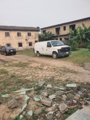 Strategically Located 2 Plots of Land in a Busy Area with Structure on