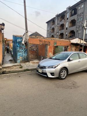 Vacant Demolished Bungalow (half Plot) on a Tarred Street, Off Adeshina Road, Ijesha, Surulere, Lagos, Mixed-use Land for Sale