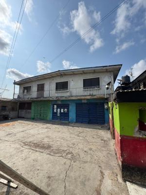Storey Building of in Location Ideal for Residential & Commercial Use, Surulere, Lagos, Block of Flats for Sale