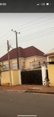 Expanse Land with Twin Duplex at Akpabio Nwodo Street Old GRA Enugu