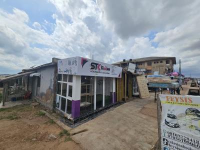 Commercial Land with Existing Building on Adigbe Road