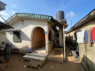 Bungalow and Self Contained Flats on Half Plot of Land