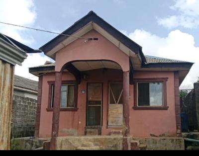 A Bungalow Structure, Sitting Half Plot of Land in a Good Neighbourh
