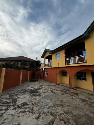 A Twin Storey Building Comprising 3-Bedroom Units and 4 Units of 2-Bed