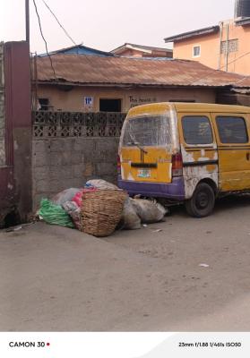 A Bungalow on a Full Plot of Land Shomolu Off Marke