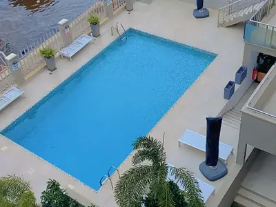 Waterfront 3-Bedroom Apartment with Jetty Access and Swimming Pool