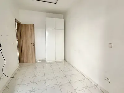 Standard Upstairs Bedroom Inside a Shared Duplex
