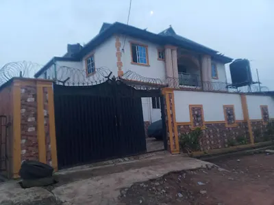 Massive 9 Bedroom Storey Building with Deed