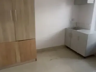 A Mini Studio Apartment with an Open Plan Kitchen