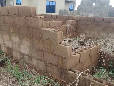 Half Plot of Land with Uncompleted Mini Flat Structure