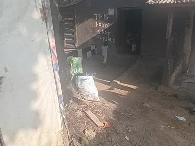 A Bungalow on a Full Plot of Dry Land Facing a Commercial Road