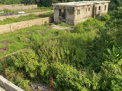 Half Plot of Land in a Secured Estate
