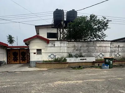 Land Measuring 1000SQM with Demolishable Structure