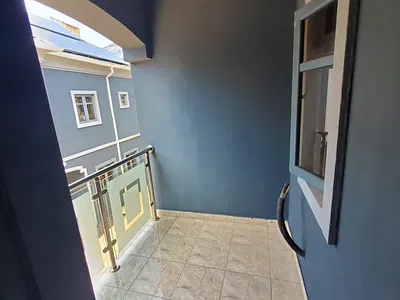 Fully Serviced Masters Bedroom Upstairs with Balcony