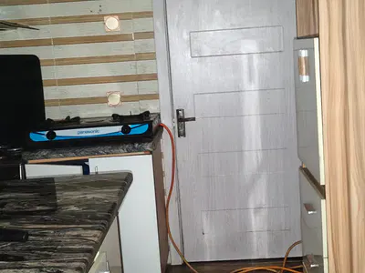 Room Downstairs in a Shared Apartment House