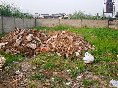 A Fenced and Gated Land Measuring Approx 500SQM with Good Title