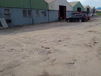 Warehoue Sitting on a Large Parcel of Land