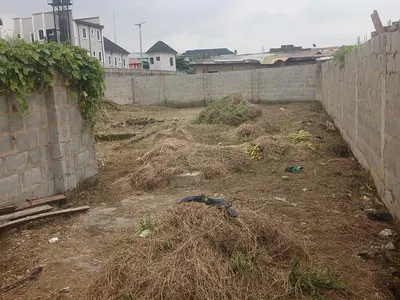 A Fenced and Gated Plot of Land Measuring 450 Square Meters
