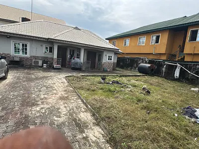 Lovely 2 Bedroom Bungalow on a Full Plot of Land
