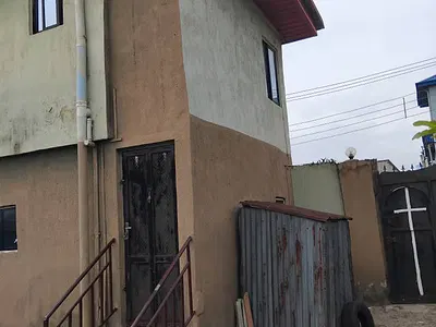 2 Plots with a Building on It