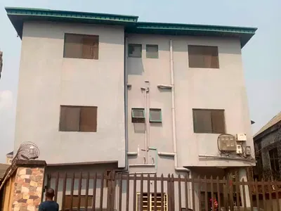 Decent Two Storey Building with Blocks of Flat