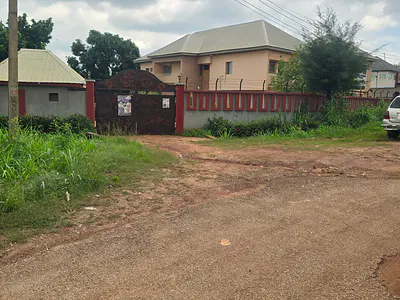 Strategically Positioned Fenced & Gated 5 Plots of Land with Duplex
