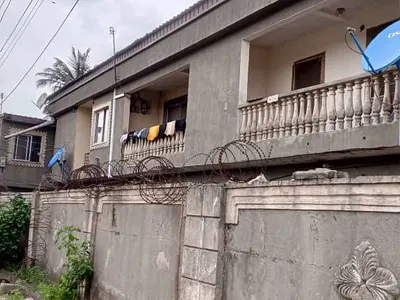 Flats with 4-Units of 3-Bedroom Flats, 2-Units of 2bedroom. 2-Unit of