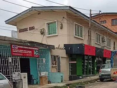 A Storey Building with Shops with 4 Block of 2 Bedroom.