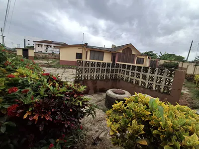 3100SQM of Land with Demolishable Structures on the Main GRA