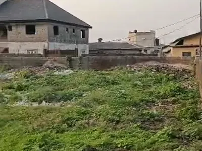 Land Measuring 2 Plots Together Fenced and Gated