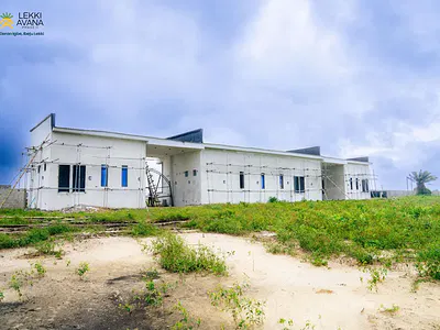 Own Premium Dry C of O Land in a Good Location with Houses