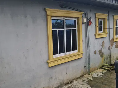 A Bungalow Comprises of 2 Mini Flats and 3 Room Self Contained