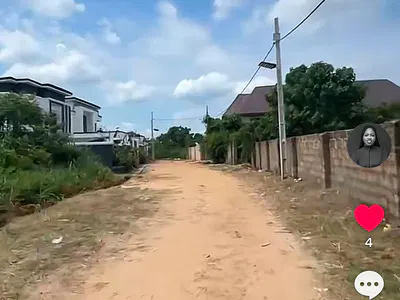Fully Fenced Dry Land in a Developed Area — Agu, Awka, Anambra