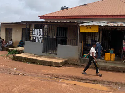 Fence Round 350 SQM of Land with a Building on It with 7 Shops