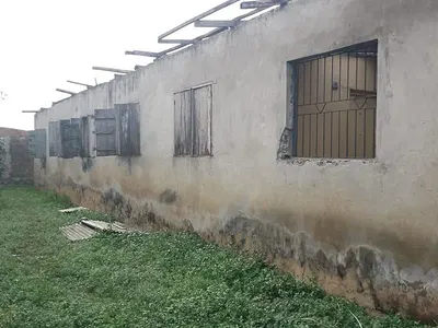 A Vacant Land with a Demolishable Structure