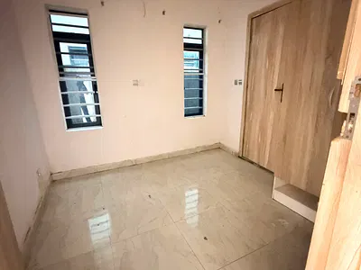 Downstairs Bedroom Inside a Shared Apartment .