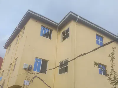 Standard Room and Parlor Upstairs in a Secured Estate