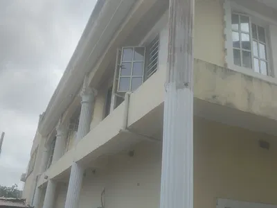 A Room and a Parlor in an Estate Within Walking Distance