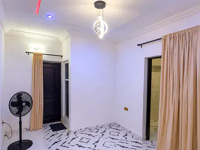 A Semi-Furnished and Standard Miniflat 'upstairs'